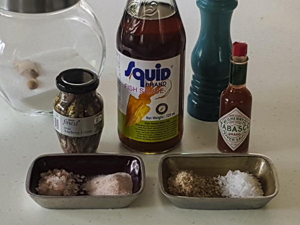 The salt in the bowls from left to right is Himalayan Pink Rock Salt, (ground and in crystal form), smoked sea salt and Maldon sea salt